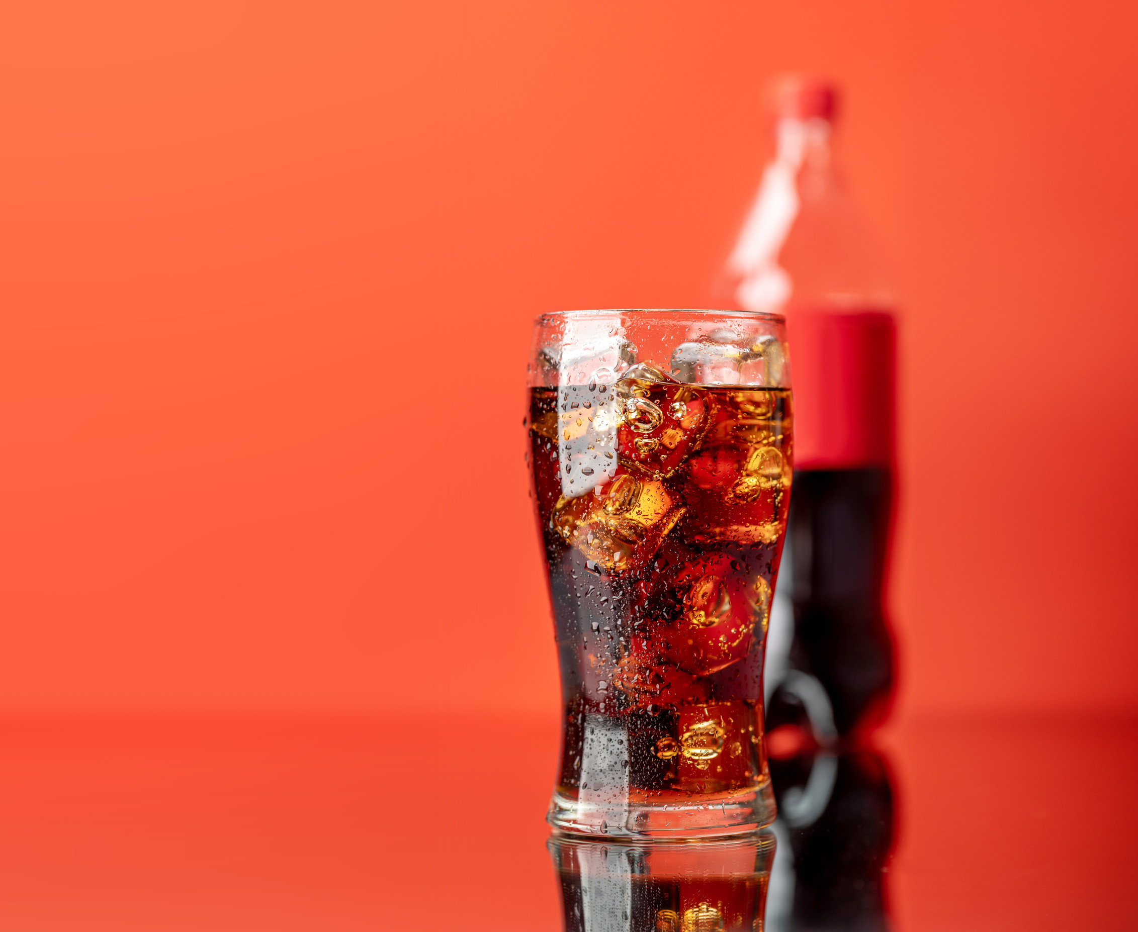 legally distinct red branded cola in a glass