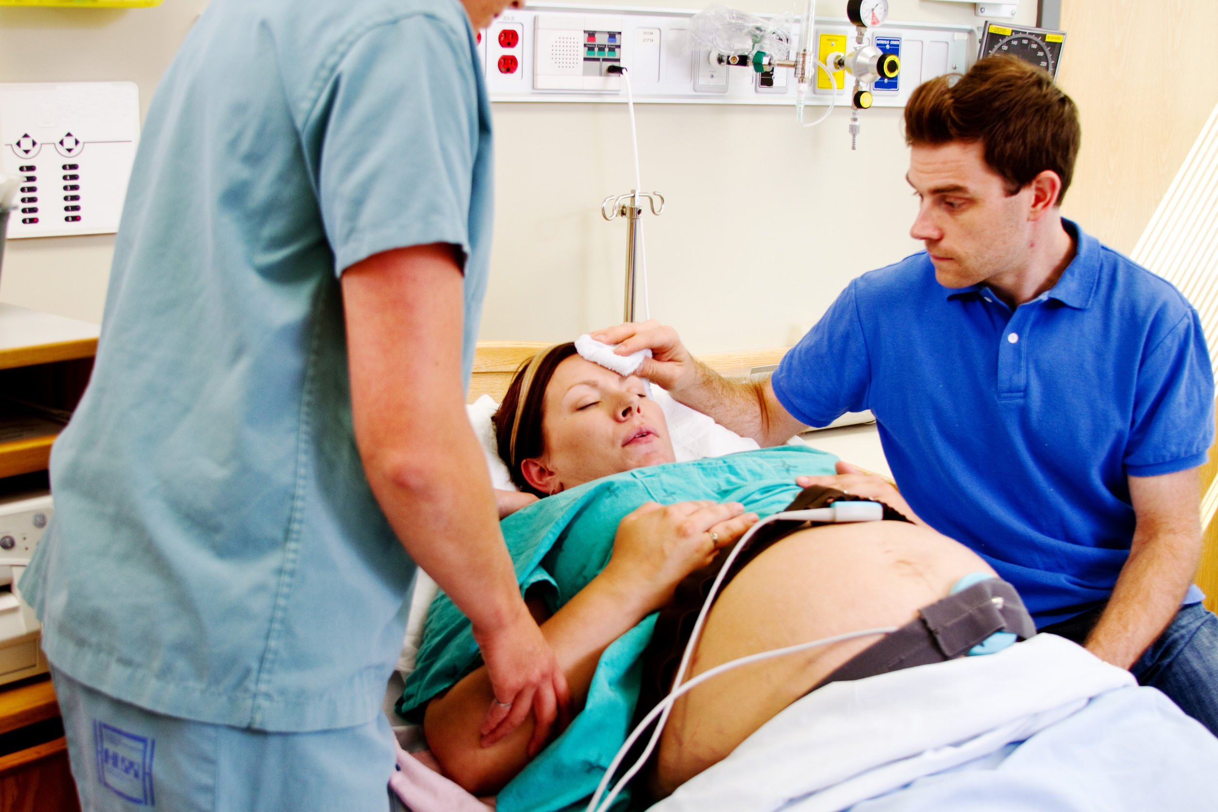 pregnant woman recieves care in a hospital