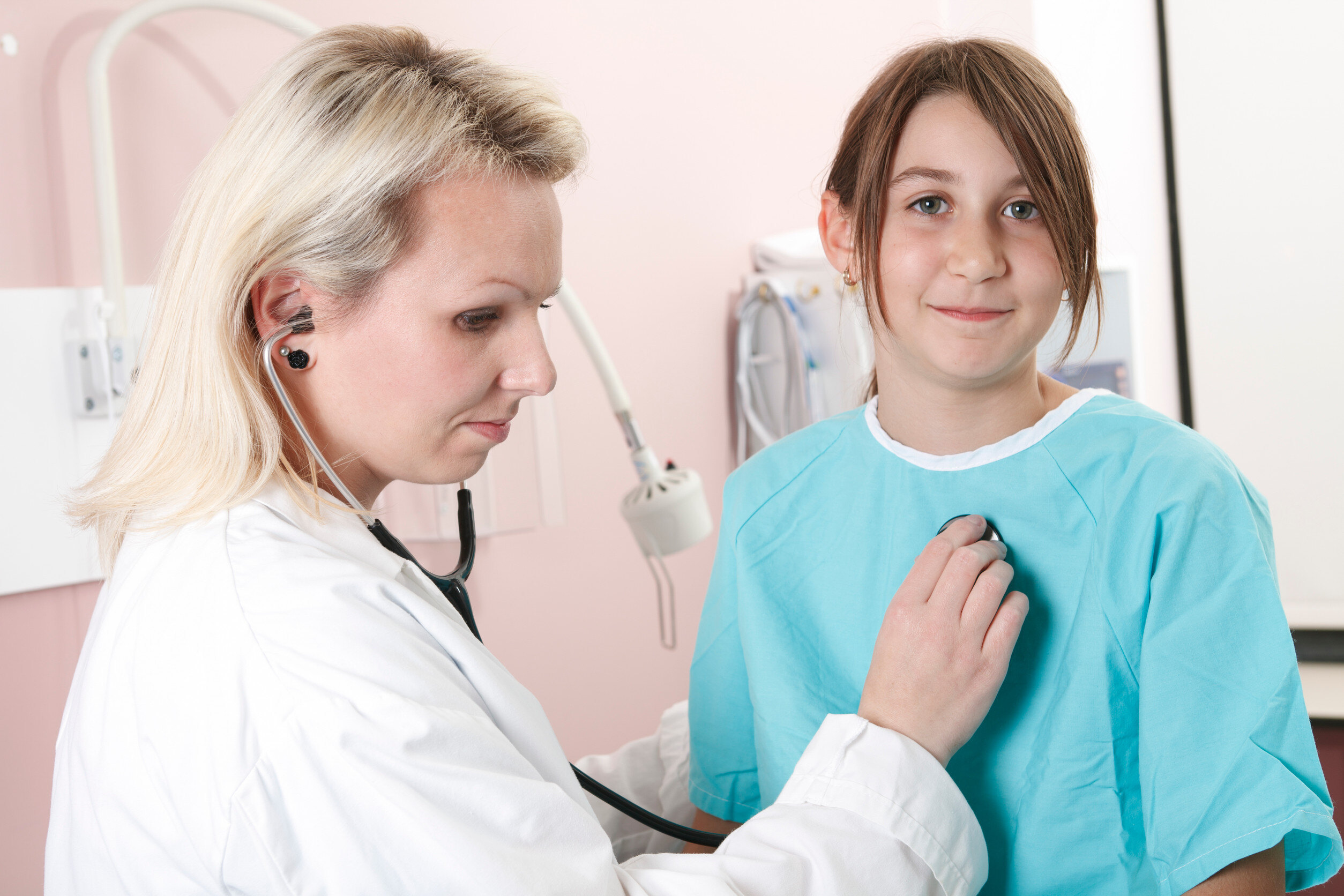 doctor examining a patient with a stethoscope 