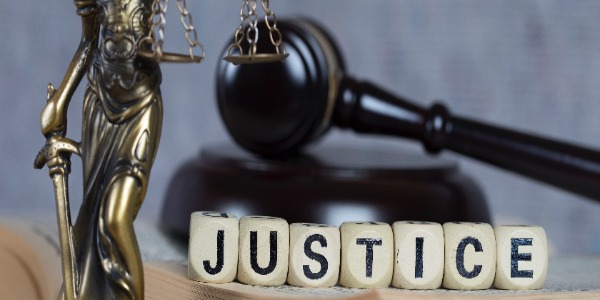 word-justice-composed-of-wooden-letters-statue-themis-and-judge-s-gavel