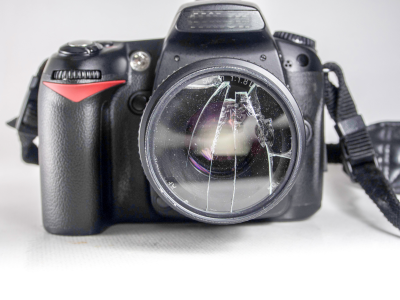 Picture of a camera with a cracked lense. 