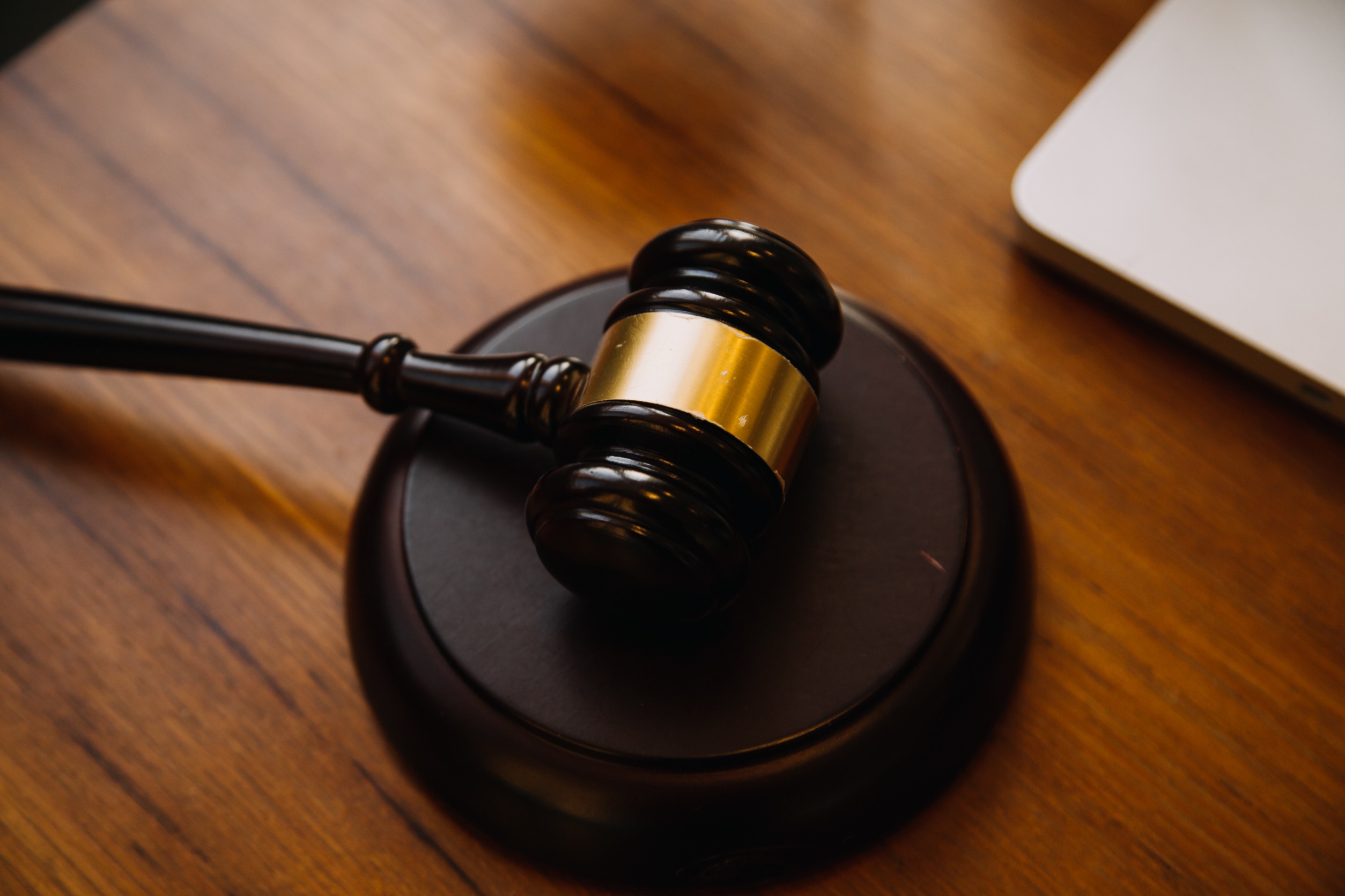 Judge gavel on a wooden desk