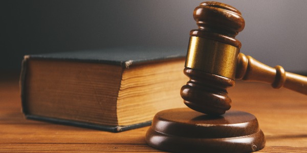 court-gavel-and-book-on-wooden-table