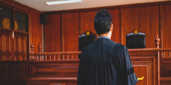 the-back-of-a-judge-in-a-courtroom