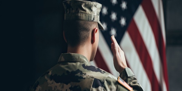 an-american-soldier-salutes-in-front-of-the-flag-of-the-united-states-of-america