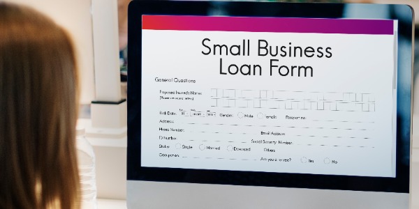 small-business-loan-form-tax-credits-niche-concept
