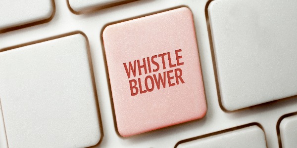 whistleblowing-concept-white-keyboard-with-a-red-key-and-the-whistleblower-word.