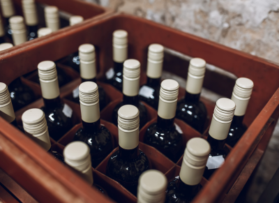 16 wine bottles in a crate